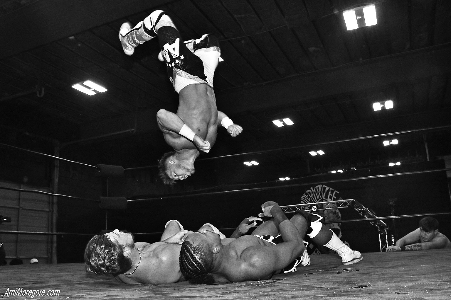 Action Andretti Mid Air with a moonsault on two opponents