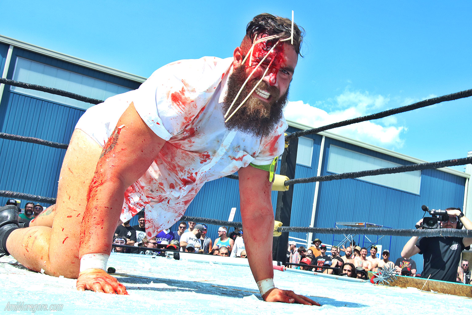 Big Joe crawls with meat skewers sticking out of his head at Tournament of Death - 2019
